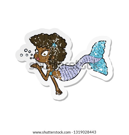 retro distressed sticker of a cartoon mermaid blowing kiss