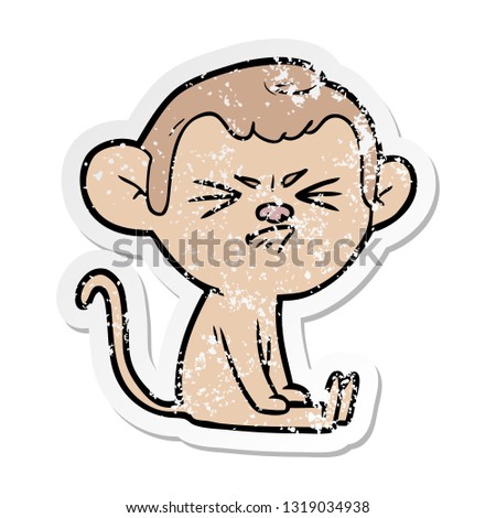 distressed sticker of a cartoon angry monkey