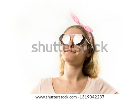 beautiful blonde girl in sunglasses on white background