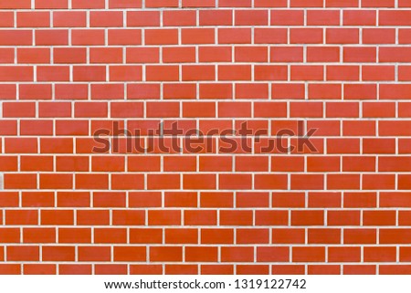 Red modern bricks wall texture for background.
