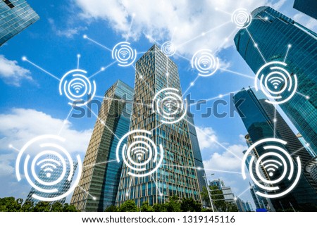 Modern buildings in blue tone with wifi icons connection, network communication in smart city