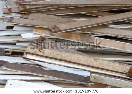 Pile of wood with nails