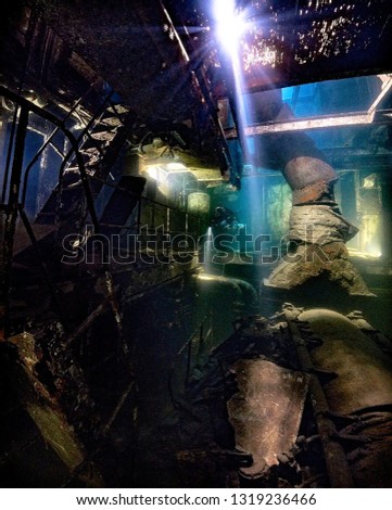 Underwater expolration inside the wreck of ship 