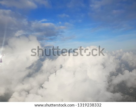 Sky and cloud with the sun shining photo from airplane, cloudscape concept, Space for text in template