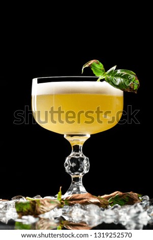Alcoholic drinks and cocktails for bars and restaurants with ice on a black background in glass glasses. For the menu.