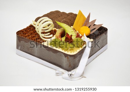 Tasty chocolate and Fruits cake isolated on white background

