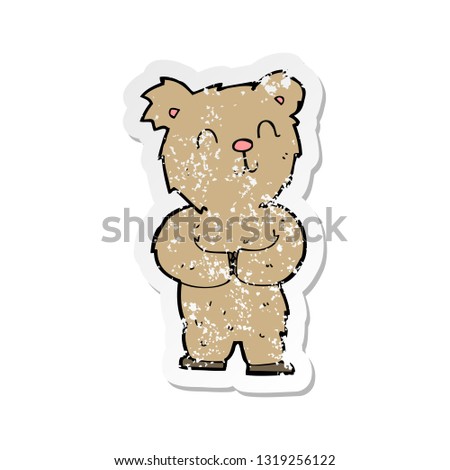 retro distressed sticker of a cartoon happy little bear