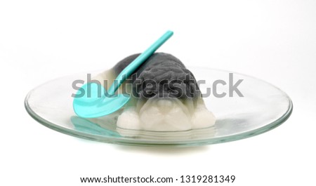 Thai desserts,gray shape-dog jelly on white background