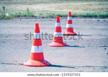 Road cones on the asphalt. Selective focus