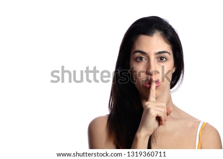 girl asking for silence, the model has black hair and pink lips on white background, the photo has space for text
