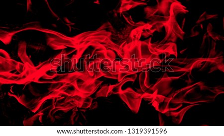 Fire flames on abstract art black colorful background 