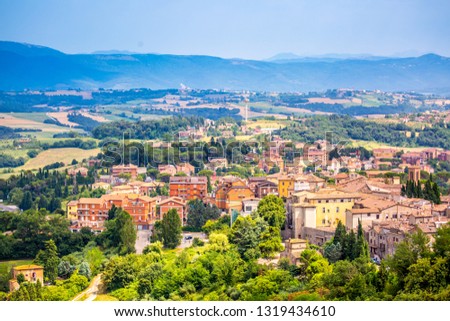 Medieval town Todi, Italy. Fortress stone tower beautiful view from above of the historic city. Europe tour excursion