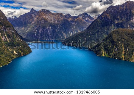 New Zealand. Milford Sound (Piopiotahi) from above - the head of the fiord, Milford Sound Airport in the background Royalty-Free Stock Photo #1319466005