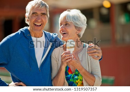 Portrait of a smiling senior couple having fun while on vacation together.