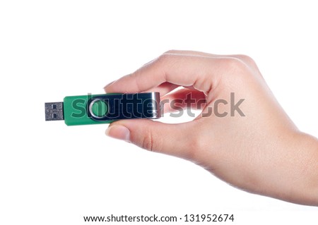 Flash drive in hand isolated on white background