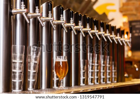 picture of a beer pump in a beer bar