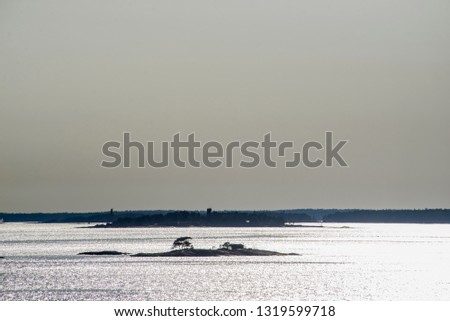 silhouette of the island, lighthouse, Finland