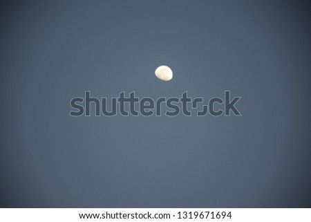 The moon in the sky in the evening