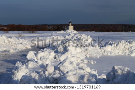 Beautiful photo of the winter landscape of the white Christian Church near Bogolyubovo
