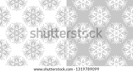 Compilation of gray and white floral patterns. Set of seamless backgrounds
