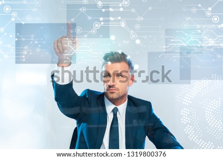 handsome businessman pointing on innovation technology isolated on white, artificial intelligence concept