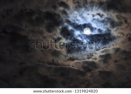 Mysterious night sky with full moon. Lunar landscape