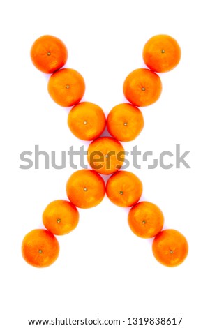 Letter solved with tangerines isolated on white background. Mandarine «X» letter