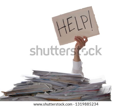 Person under a pile of papers with a hand holding a sign of help. Accounting. 
