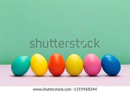 easter eggs on colour background