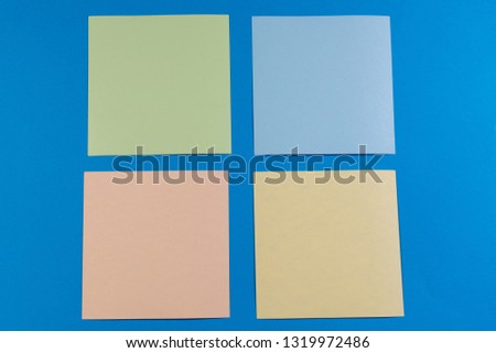 abstract background paper texture colored squares on blue surface. geometric shape