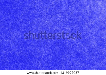 Blue felt texture background. Blue is a cool and calming color that shows creativity and intelligence. 