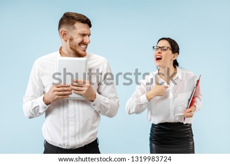 Angry boss. Woman and his secretary standing at office or studio. Businesswoman screaming to his colleague. Female and male caucasian models. Office relationships concept, Human emotions
