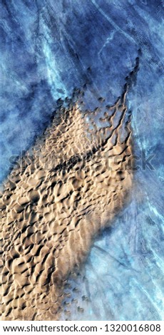 breastplate falling apart, abstract photography of the deserts of Africa from the air. aerial view of desert landscapes, Genre: Abstract Naturalism, from the abstract to the figurative, 