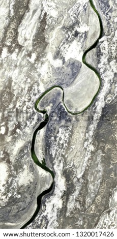 the green ribbon, abstract photography of the deserts of Africa from the air. aerial view of desert landscapes, Genre: Abstract Naturalism, from the abstract to the figurative,