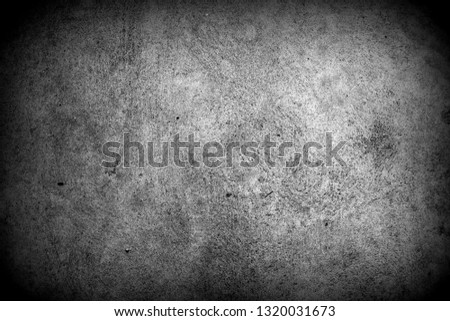 Pattern texture of grey grainy dirty porous cracked concrete surface. Mysterious background with room for text. 