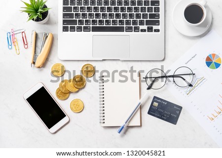 Business, accounting and payment concept financial information isolated on a modern marble office table, mock up, top view, copy space, flat lay, lifestyle, close up