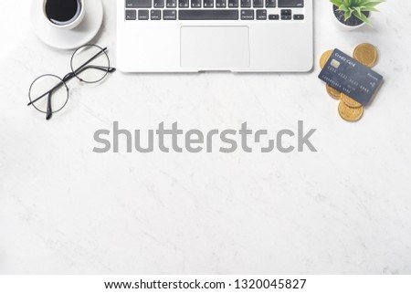 Business, accounting and payment concept financial information isolated on a modern marble office table, mock up, top view, copy space, flat lay, lifestyle, close up