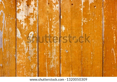 Orange boardwalk. Background texture. Wooden wall.