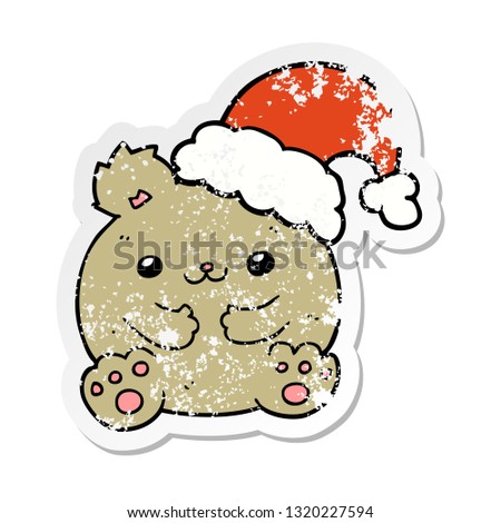 distressed sticker of a cute cartoon christmas bear