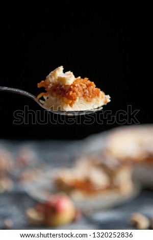 Delicious American apple pie with vintage decorations on the black background