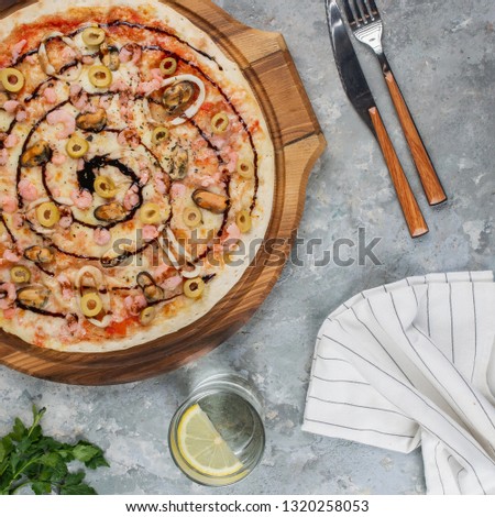 Appetizing italian pizza on wooden board