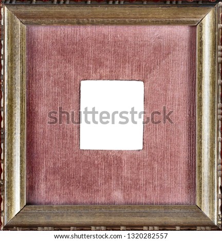 Antique golden frame with red velvet mat