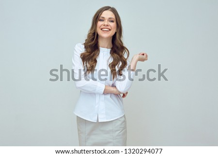 smiling businesswoman with long hair wearing white shirt isolated studio portrait.