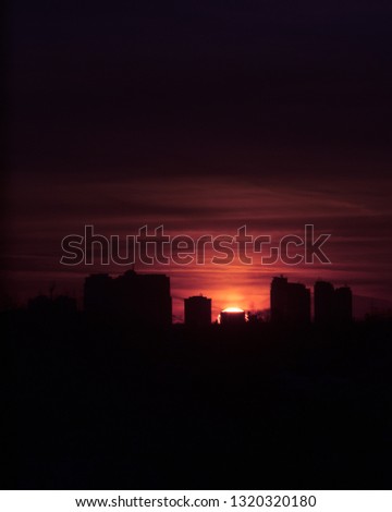 Dramatic red sunset over the city skyline, Mississauga, Canada