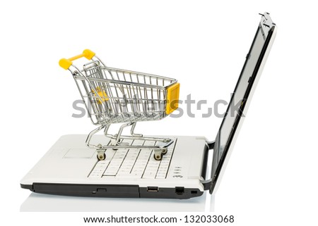 an empty cart on a laptop computer. symbolic photo for internet shopping