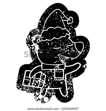 quirky cartoon distressed icon of a bear with present wearing santa hat