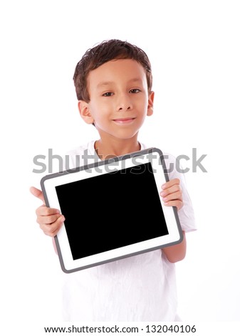 Boy showing a  tablet isolated over white background