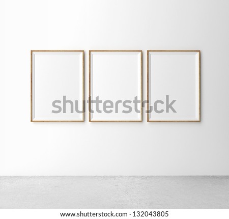 three wooden frames on wall