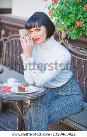 Modern literature for female. Business lady read book during coffee break. Coffee and good book for perfect weekend. Self improvement concept. Woman have drink enjoy reading good book cafe terrace.
