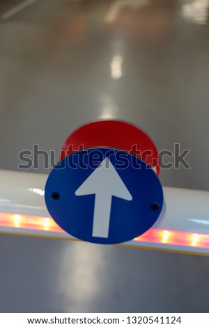 Direction signs at the entrance of an indoor parking